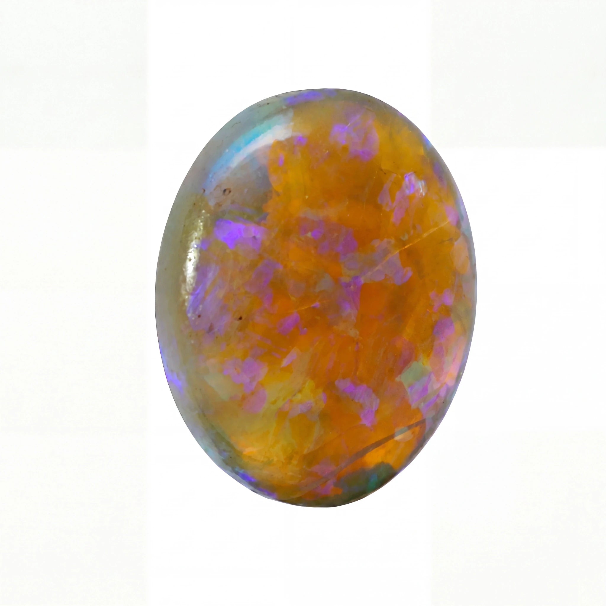 A polished oval cabochon gemstone featuring a vibrant play-of-colour with orange, purple, blue, and green iridescence on a white background.
