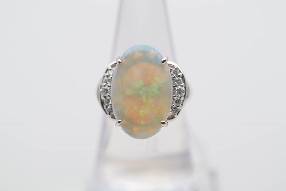 Australian Light Crystal Opal 5.34 Cts set in a 900 Platinum Ring with 10 Diamonds 0.33 Cts