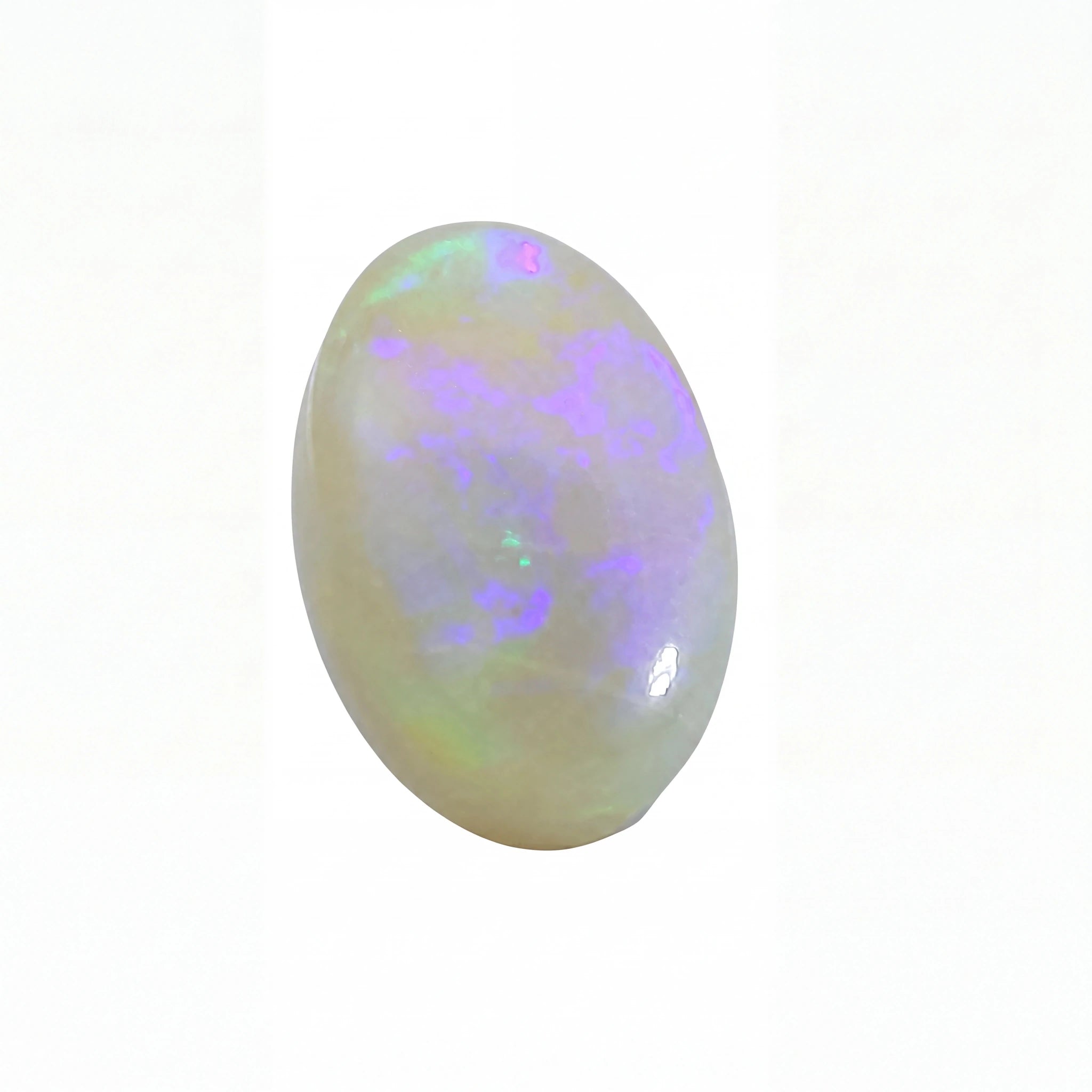 A polished oval cabochon opal gemstone displaying a milky white base with vibrant iridescent flashes of purple, blue, and green, set against a plain white background.