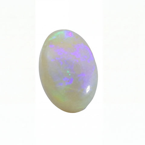 A polished oval cabochon opal gemstone displaying a milky white base with vibrant iridescent flashes of purple, blue, and green, set against a plain white background.