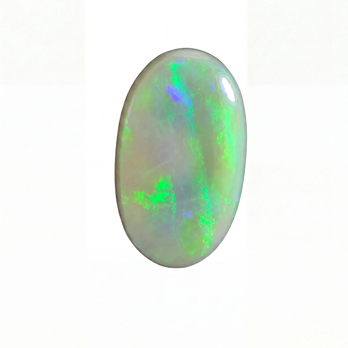 Oval-shaped opal gemstone with green and blue fluorescence on a white background