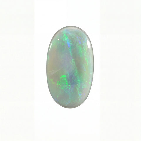 Opal stone with green and blue fluorescence on a white background