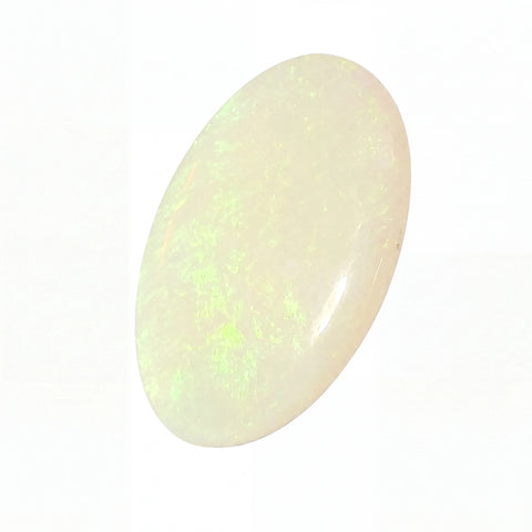 Opal stone with a greenish hue on a white background