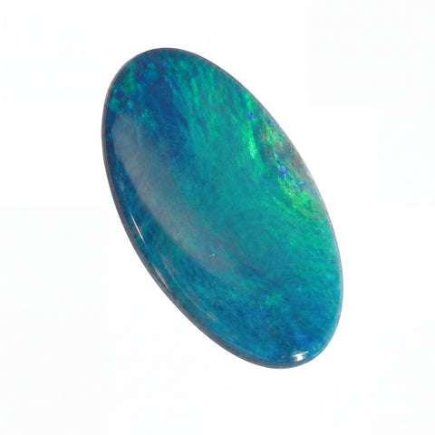 Oval-shaped opal stone on a white background