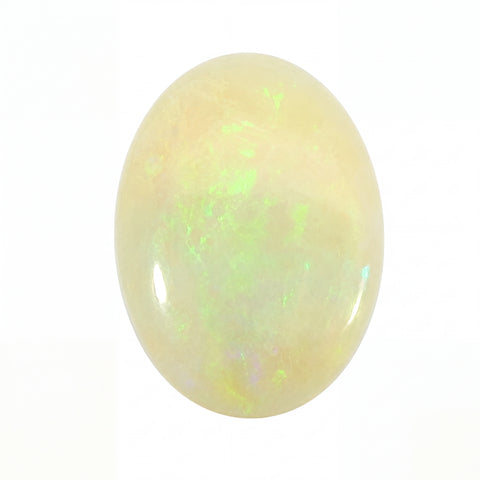 Opal stone with green fluorescence on a white background