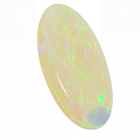 Opal stone with green and purple speckles on a white background