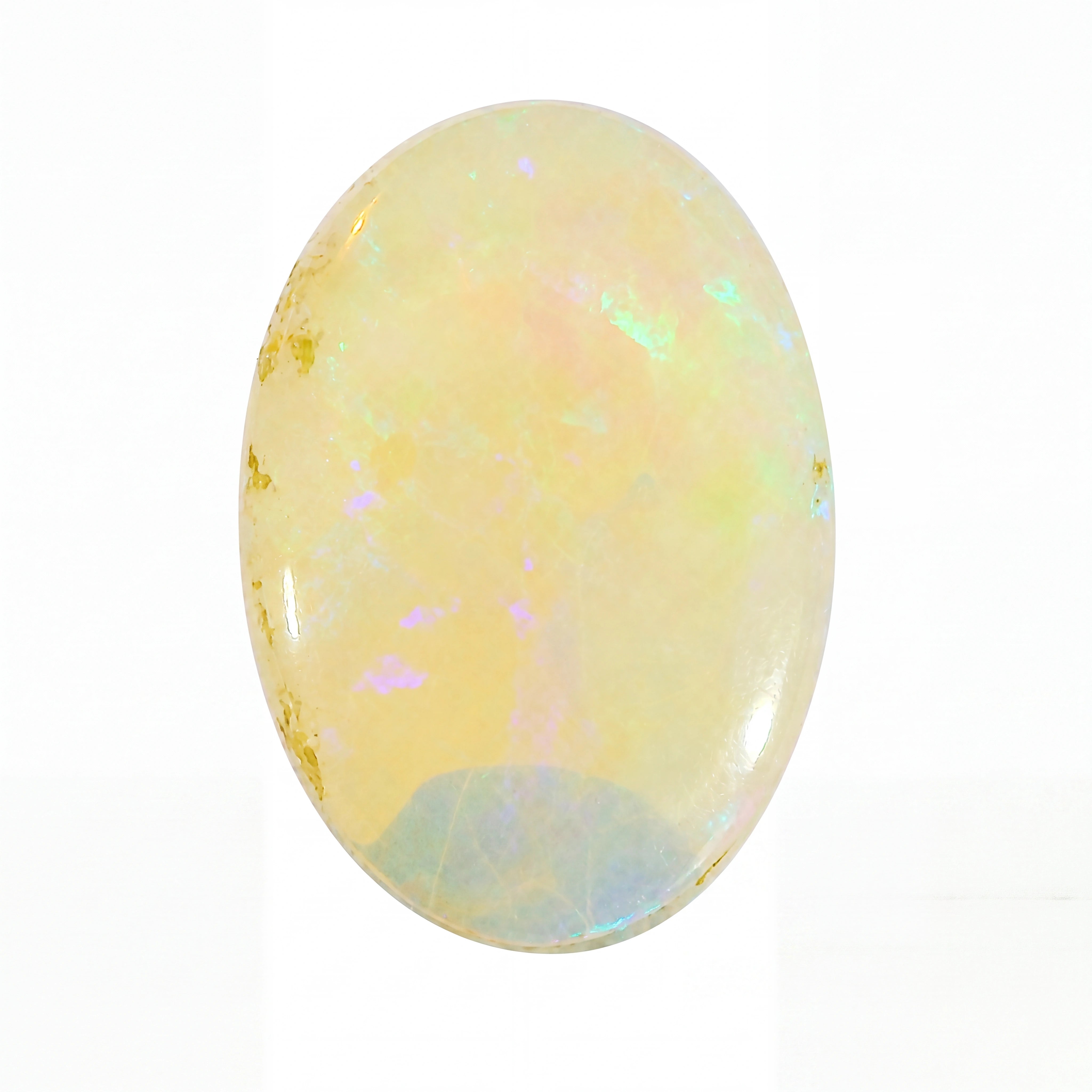 Opal stone with iridescent colours on a white background