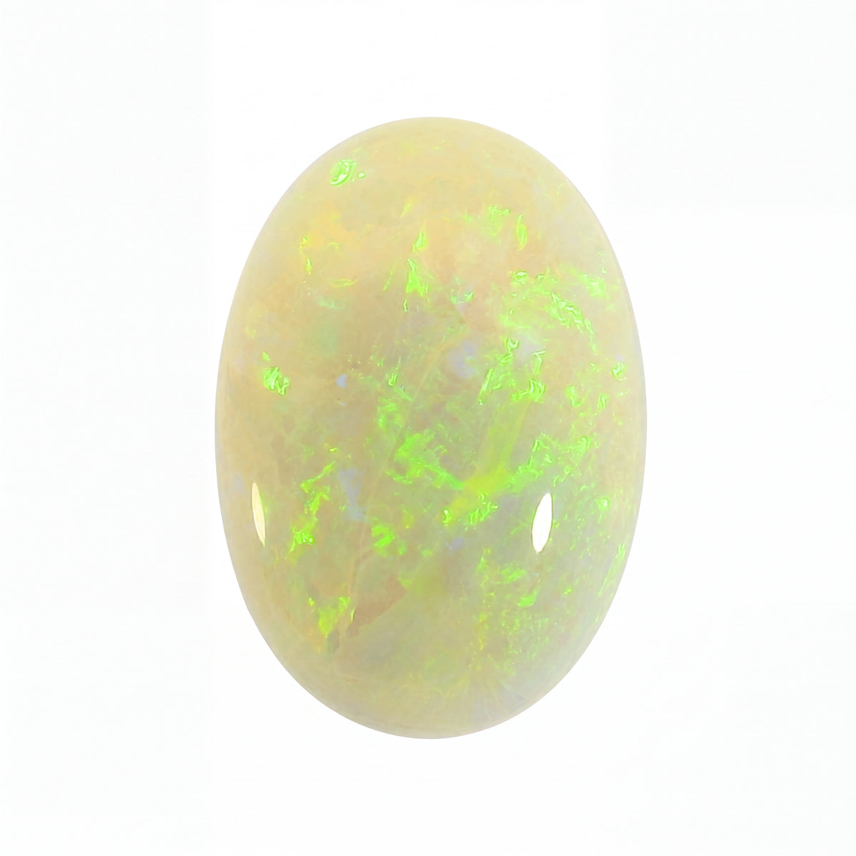 Opal stone with green and yellow fluorescence on a white background