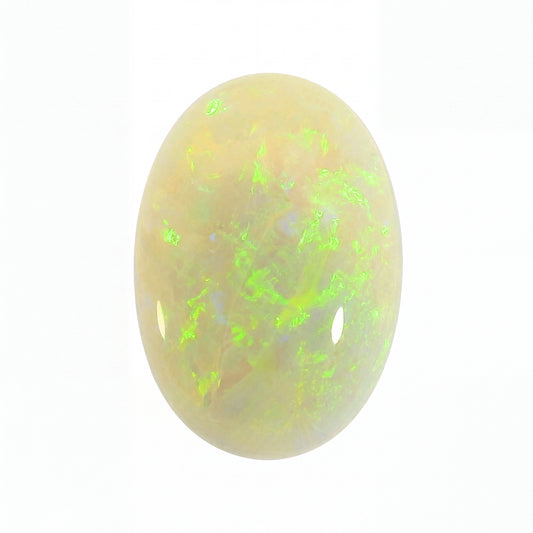 Opal stone with green and yellow fluorescence on a white background