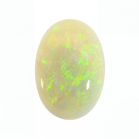 Opal stone with green and yellow fluorescence on a white background
