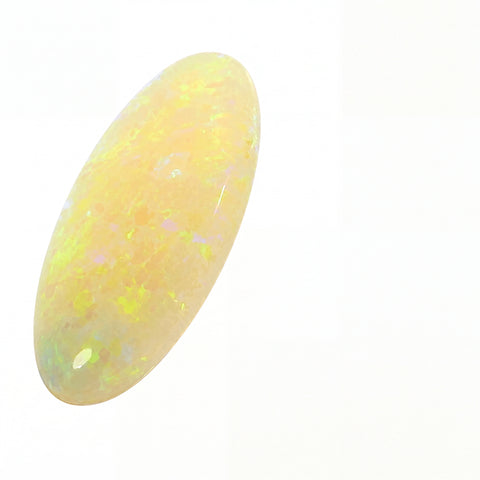 Opal stone with a yellowish hue on a white background