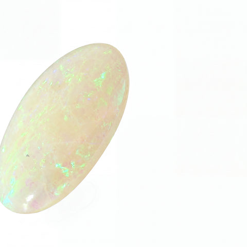 Opal stone with play of colours on a white background