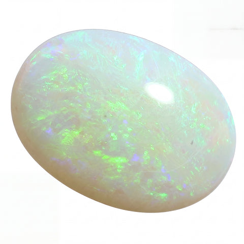 Opal stone with colourful play of light on a white background
