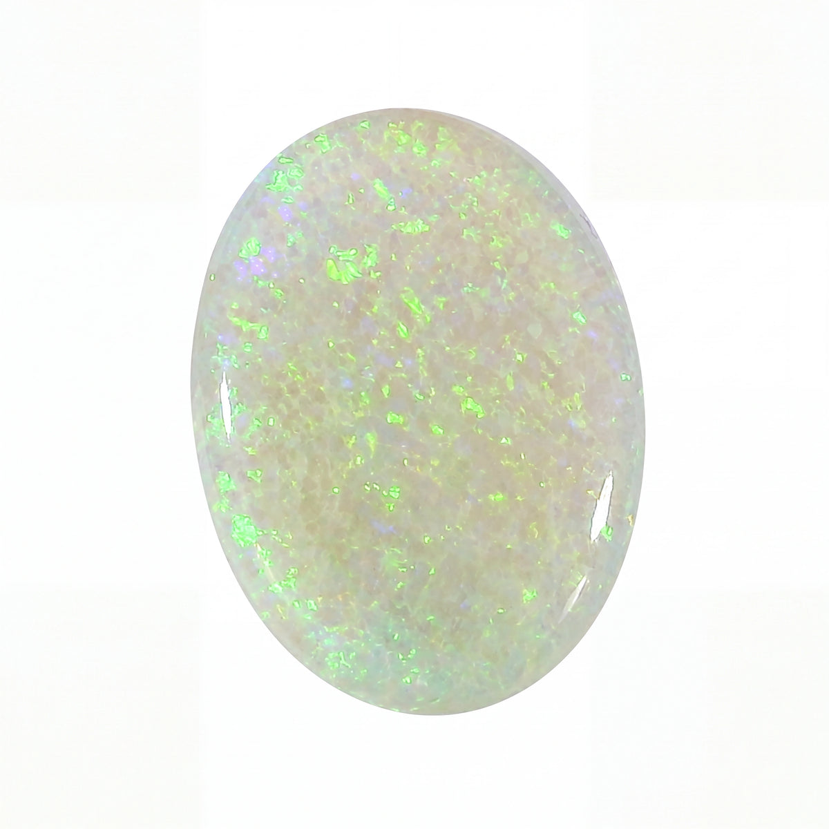 Opal stone with green fluorescence on a white background