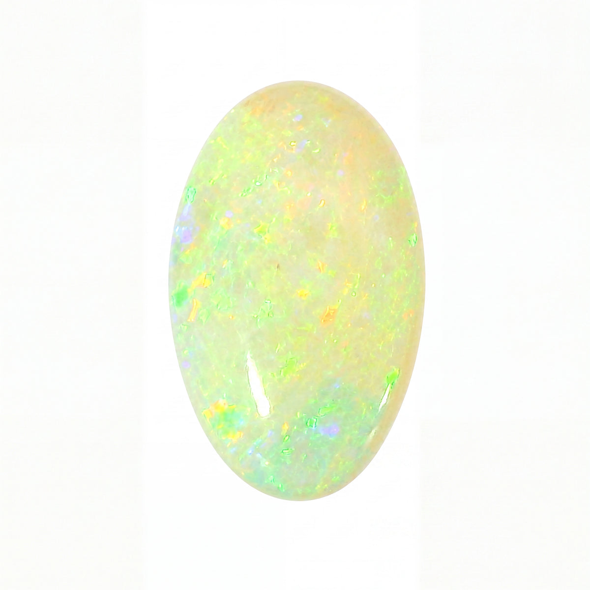 Opal stone with multicolour fluorescence on a white background