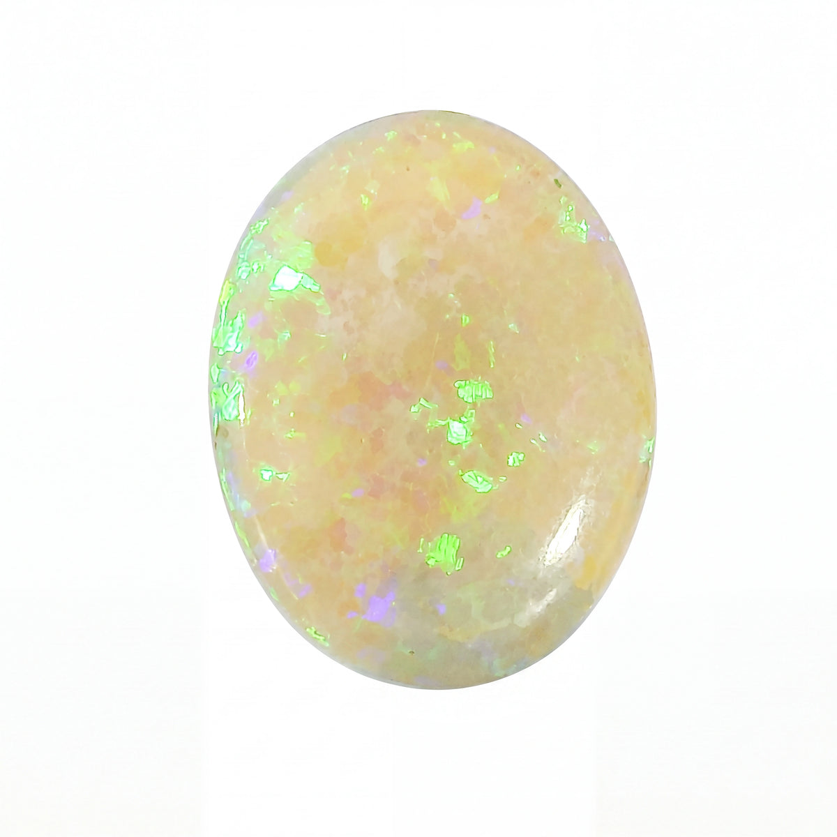 Oval-shaped opal stone with a white background