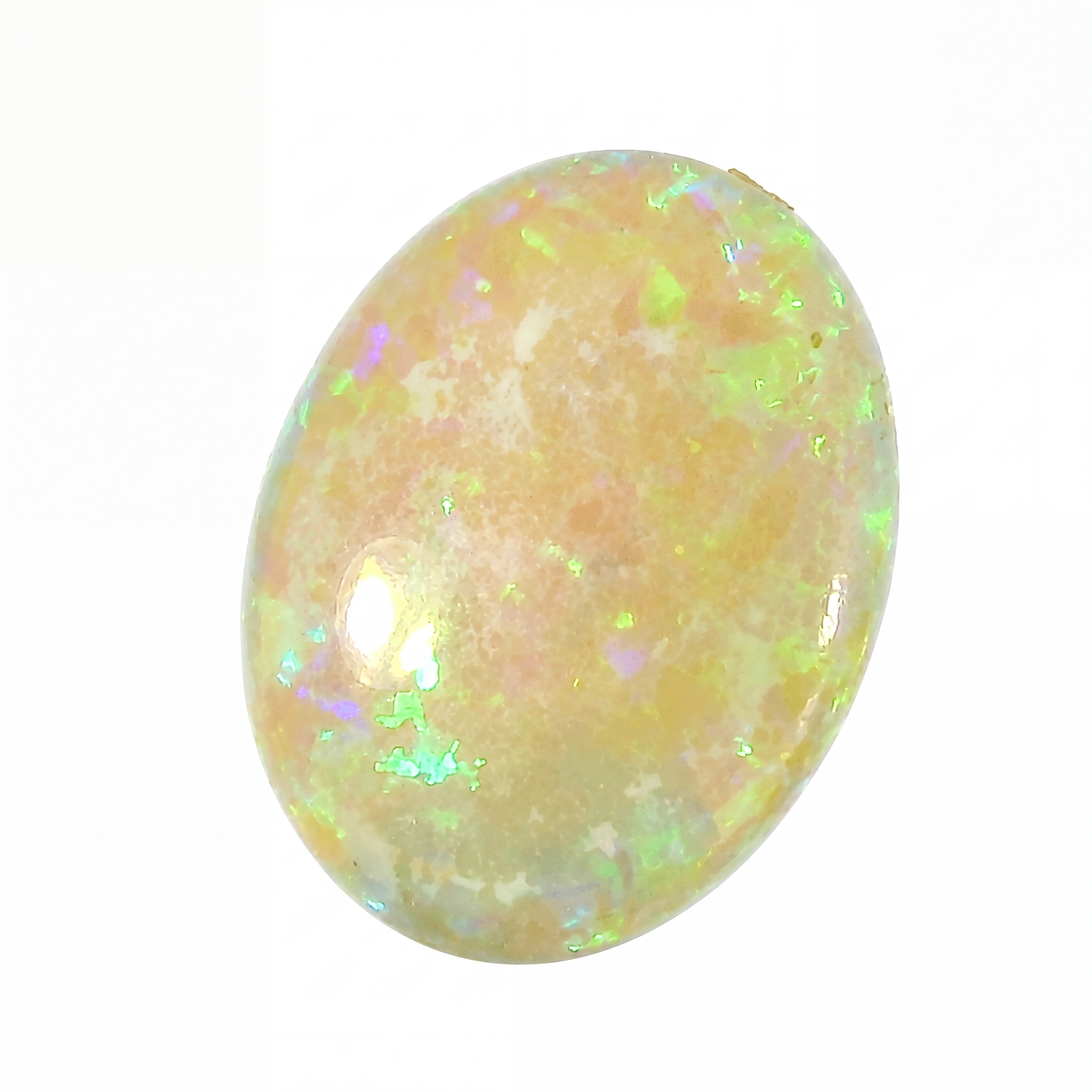Opal stone with multicolour play of light on a white background