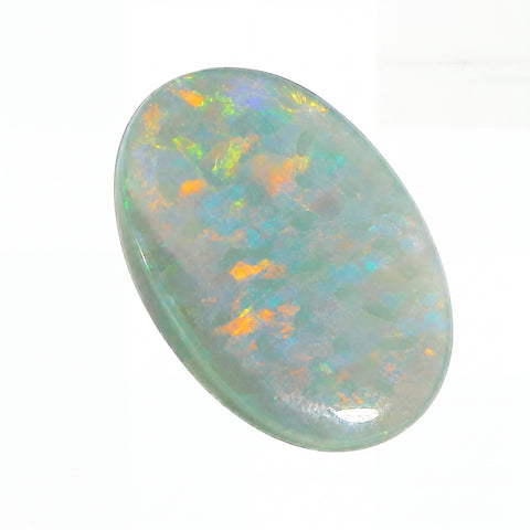 Opal stone with multicoloured play of light on a white background