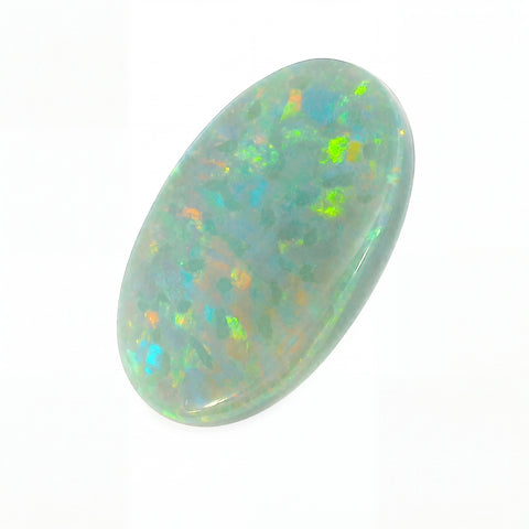 Opal stone with multicoloured fluorescence on a white background