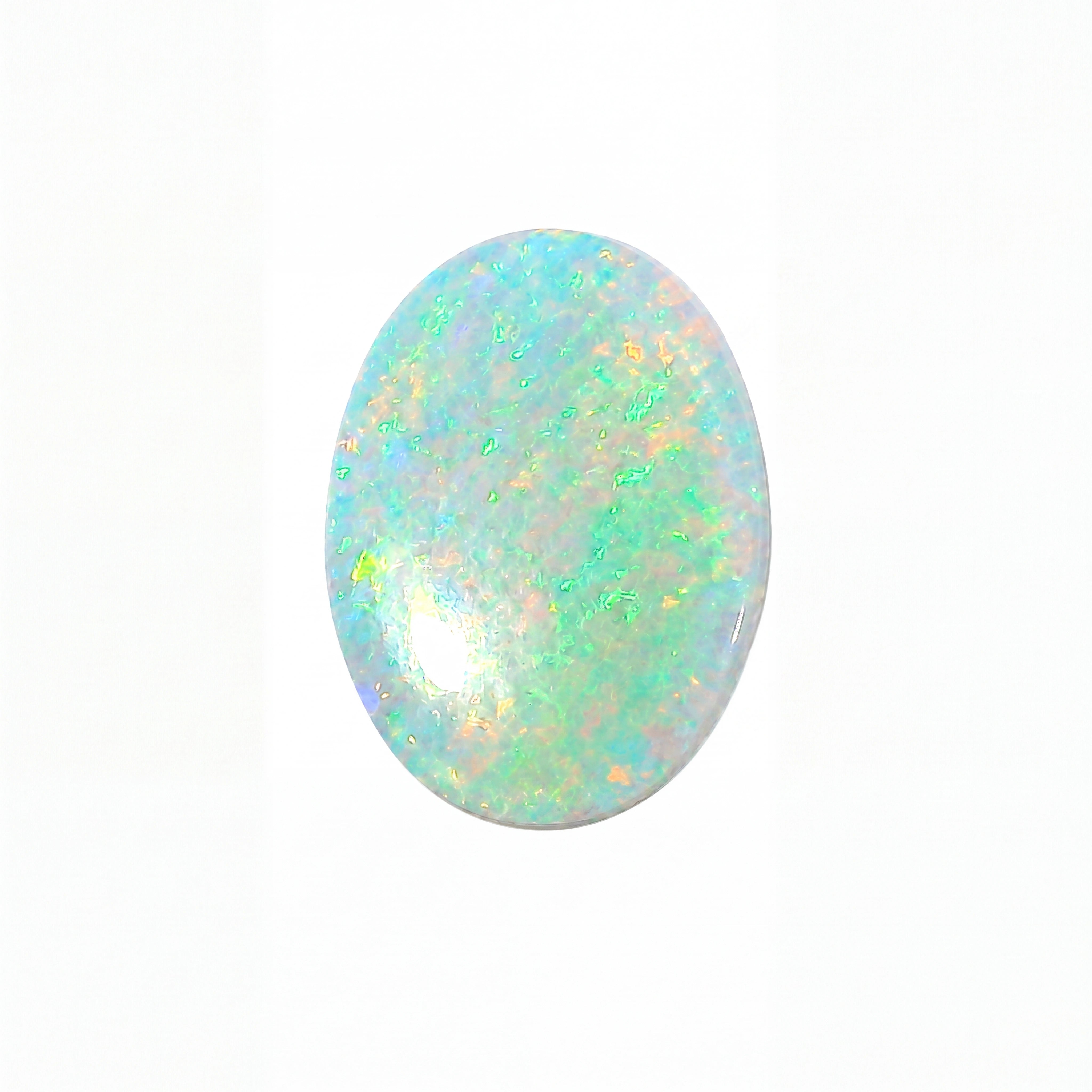 Opal stone with multicolour play of light on a white background