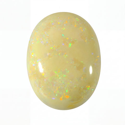 Yellow opal stone with speckled pattern on a white background