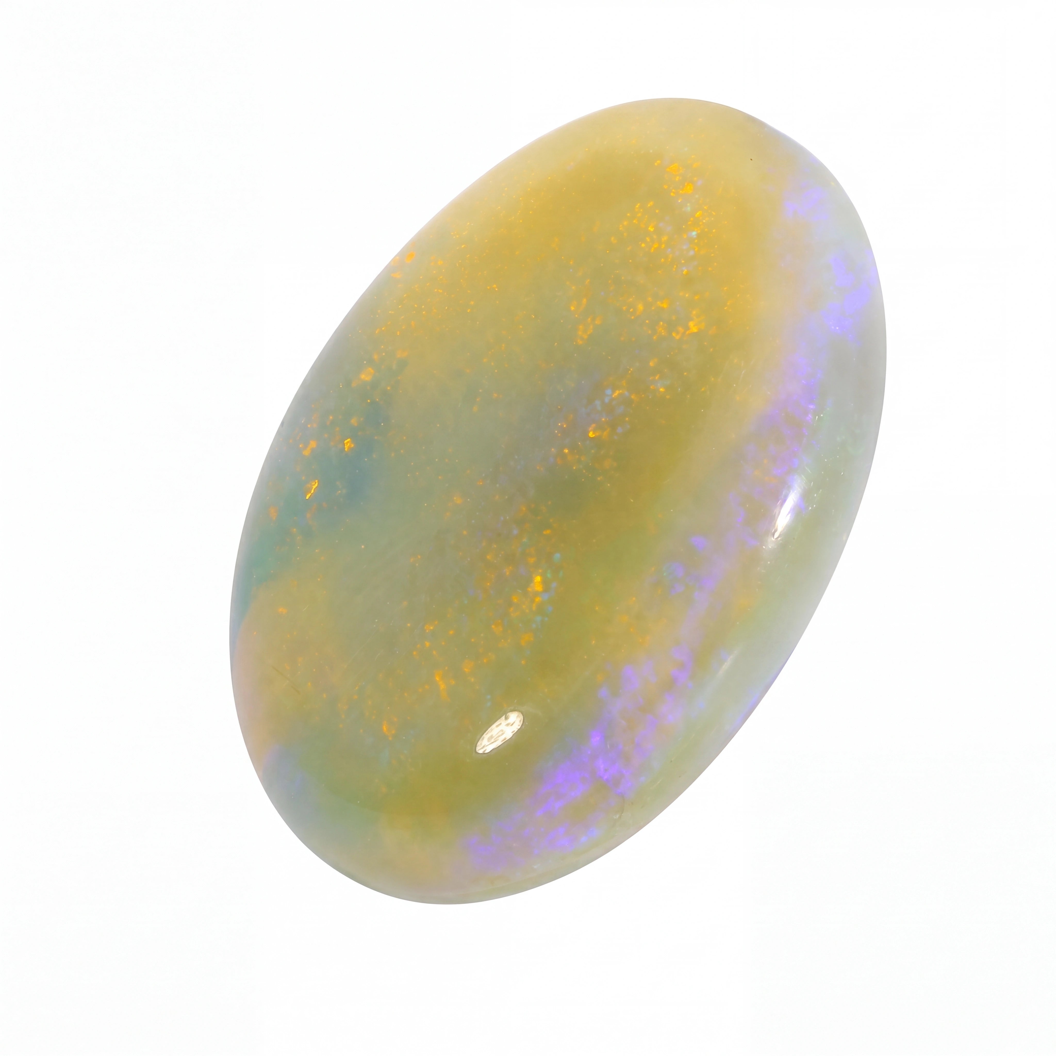 Opal stone with colourful play of light on a white background