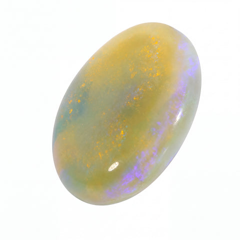 Opal stone with colourful play of light on a white background