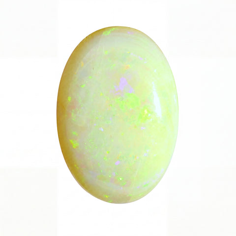 Opal stone with green and yellow fluorescence on a white background