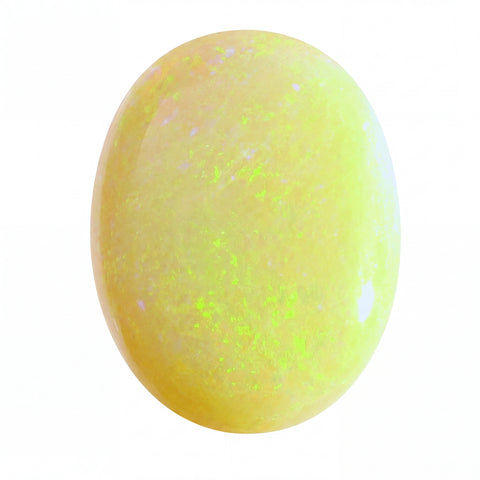 Yellow stone with green speckles on a white background