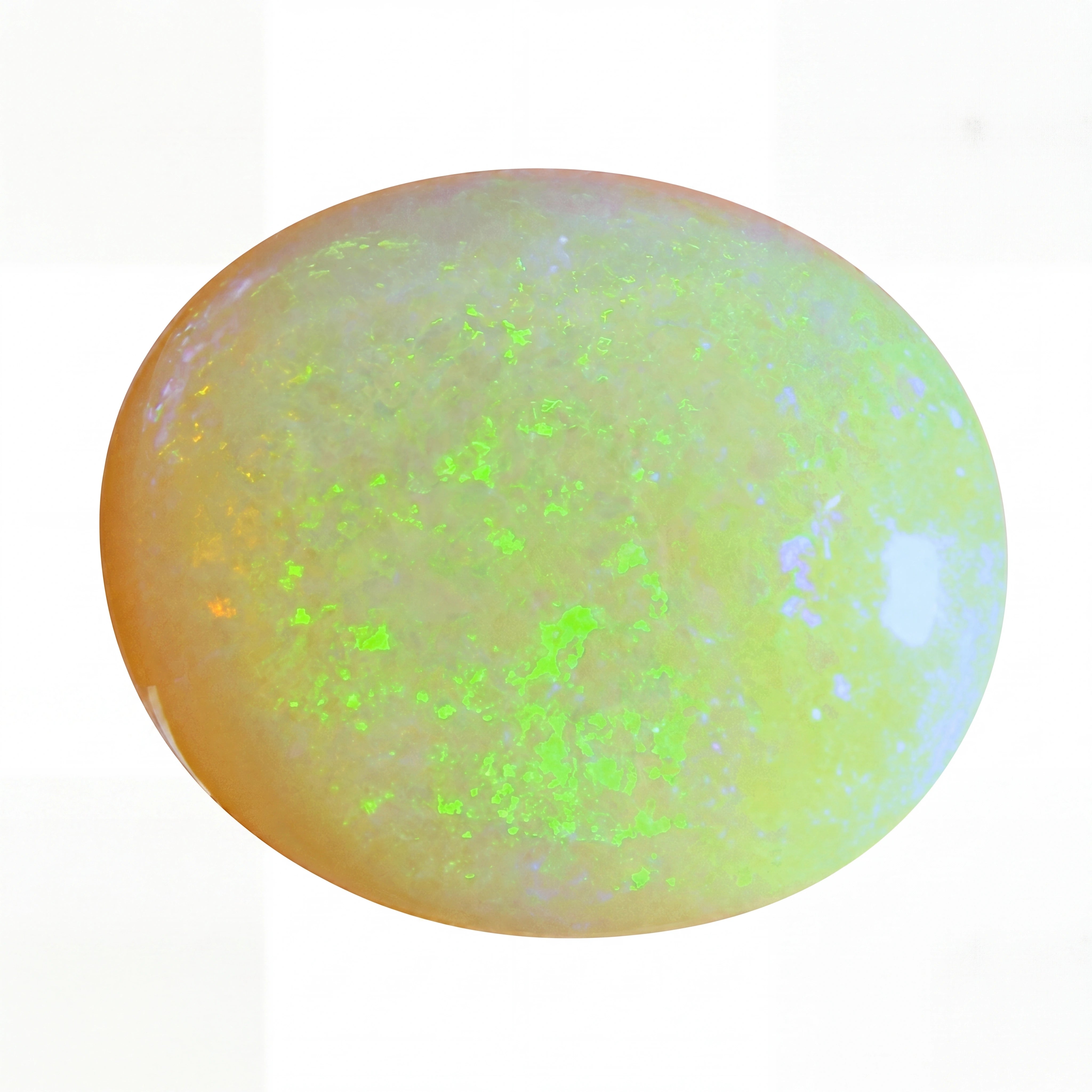 Opal stone with green fluorescence on a white background