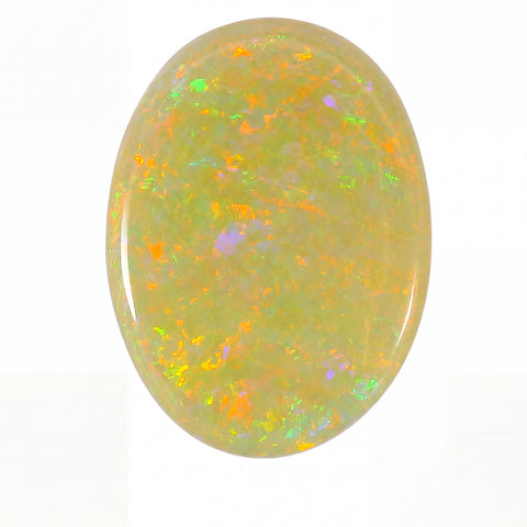 Oval-shaped opal stone with multicoloured speckles on a white background