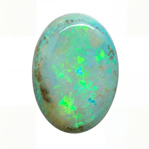 Opal stone with green and blue fluorescence on a white background