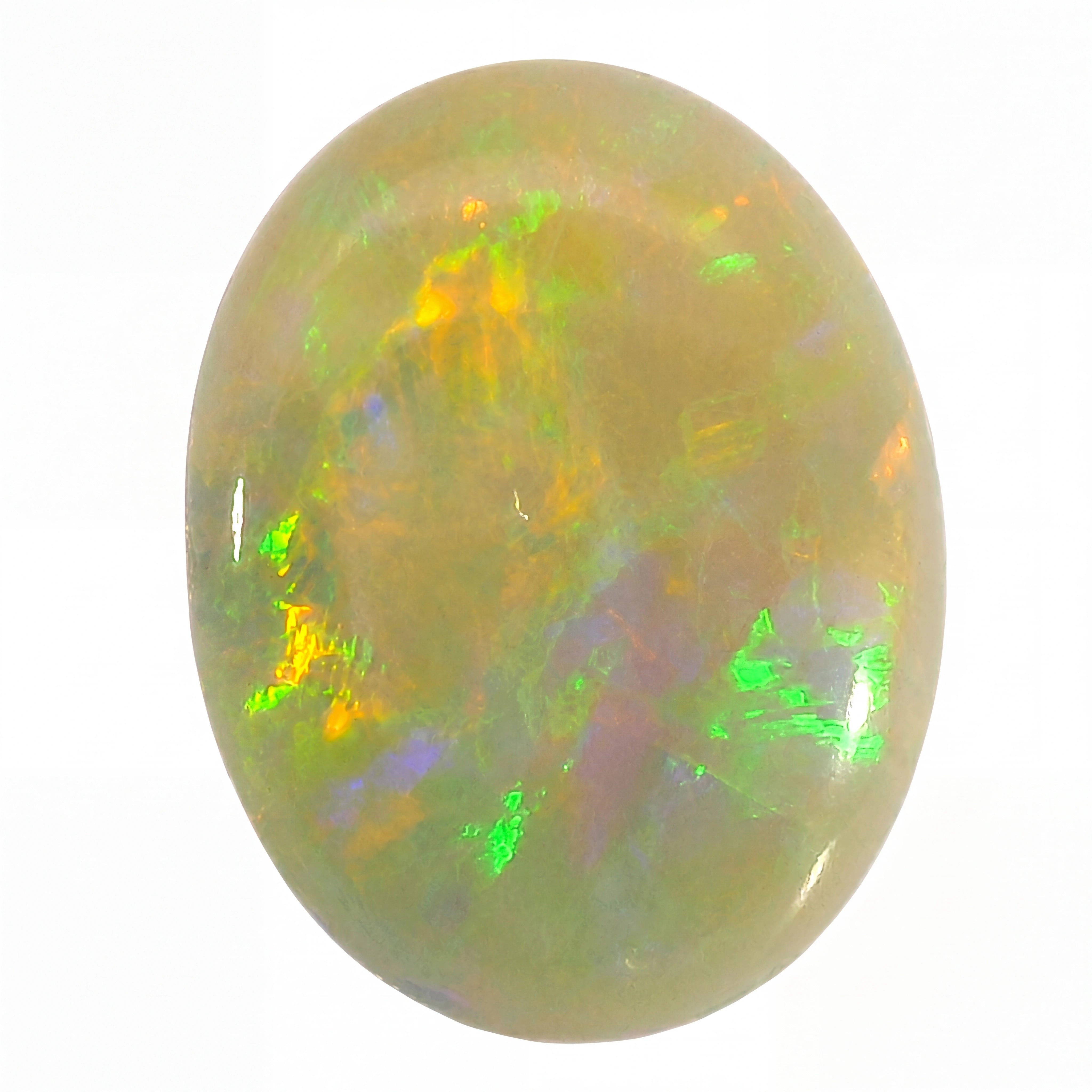 Opal stone with green and yellow fluorescence on a white background