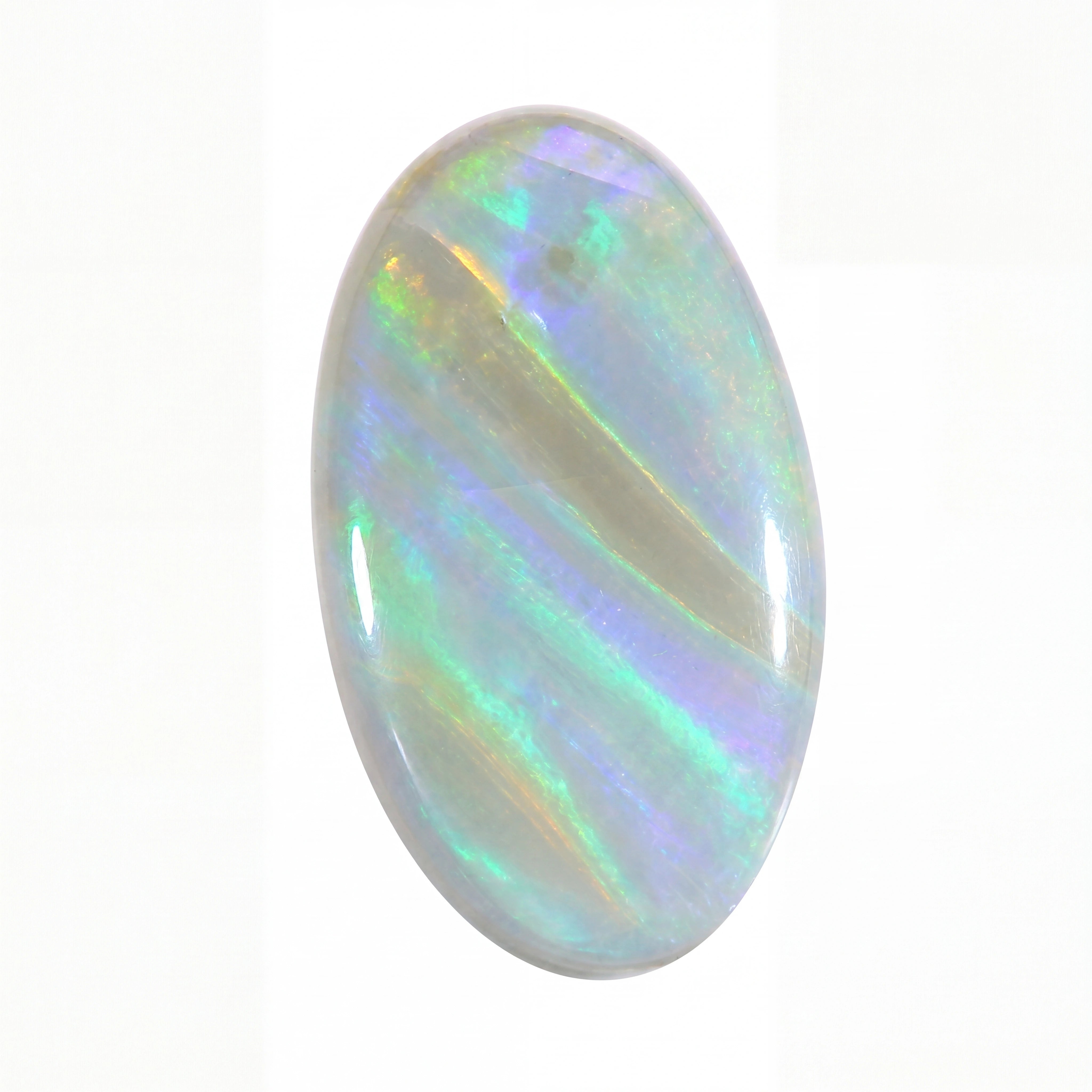 Opal stone with multicoloured play of light on a white background