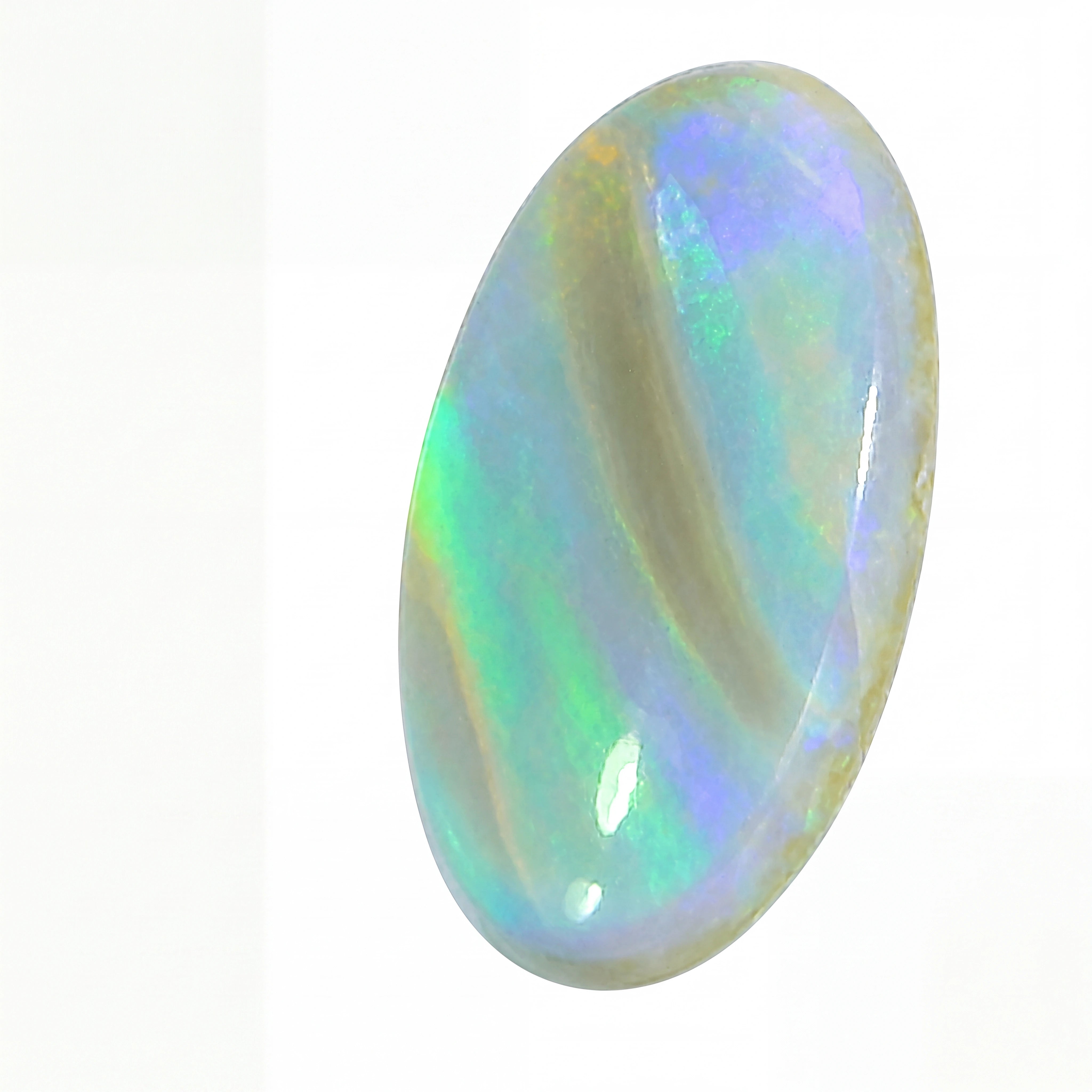 Opal stone with multicoloured play of light on a white background