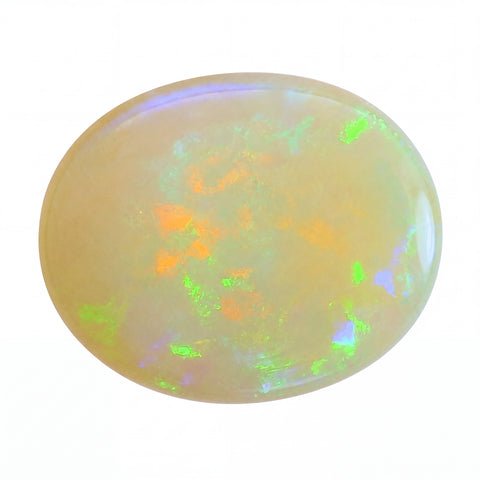 Opal gemstone with multicoloured play of light on a white background