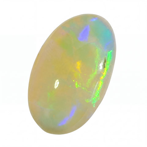 Opal stone with green and orange fluorescence on a white background