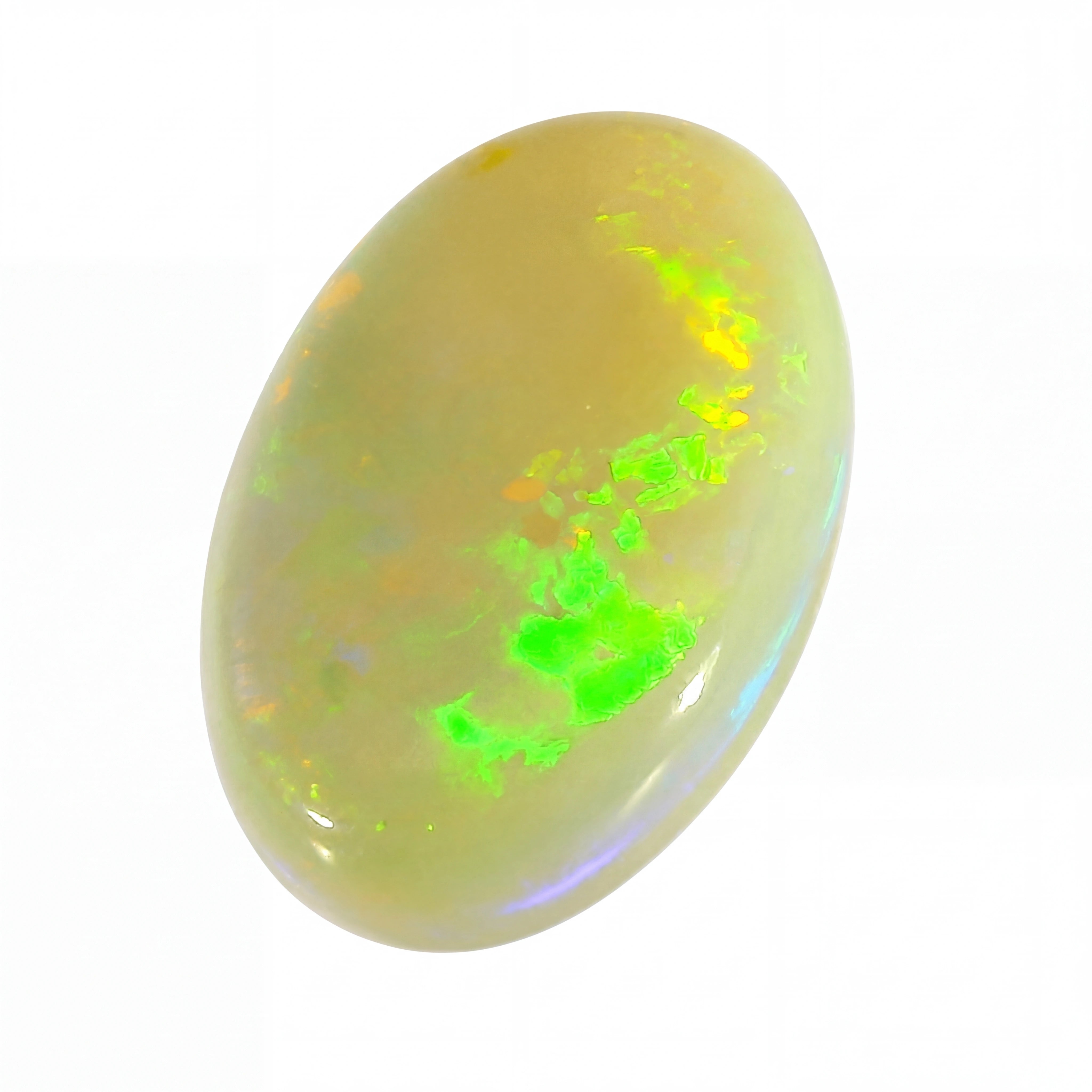 Opal stone with green fluorescence on a white background