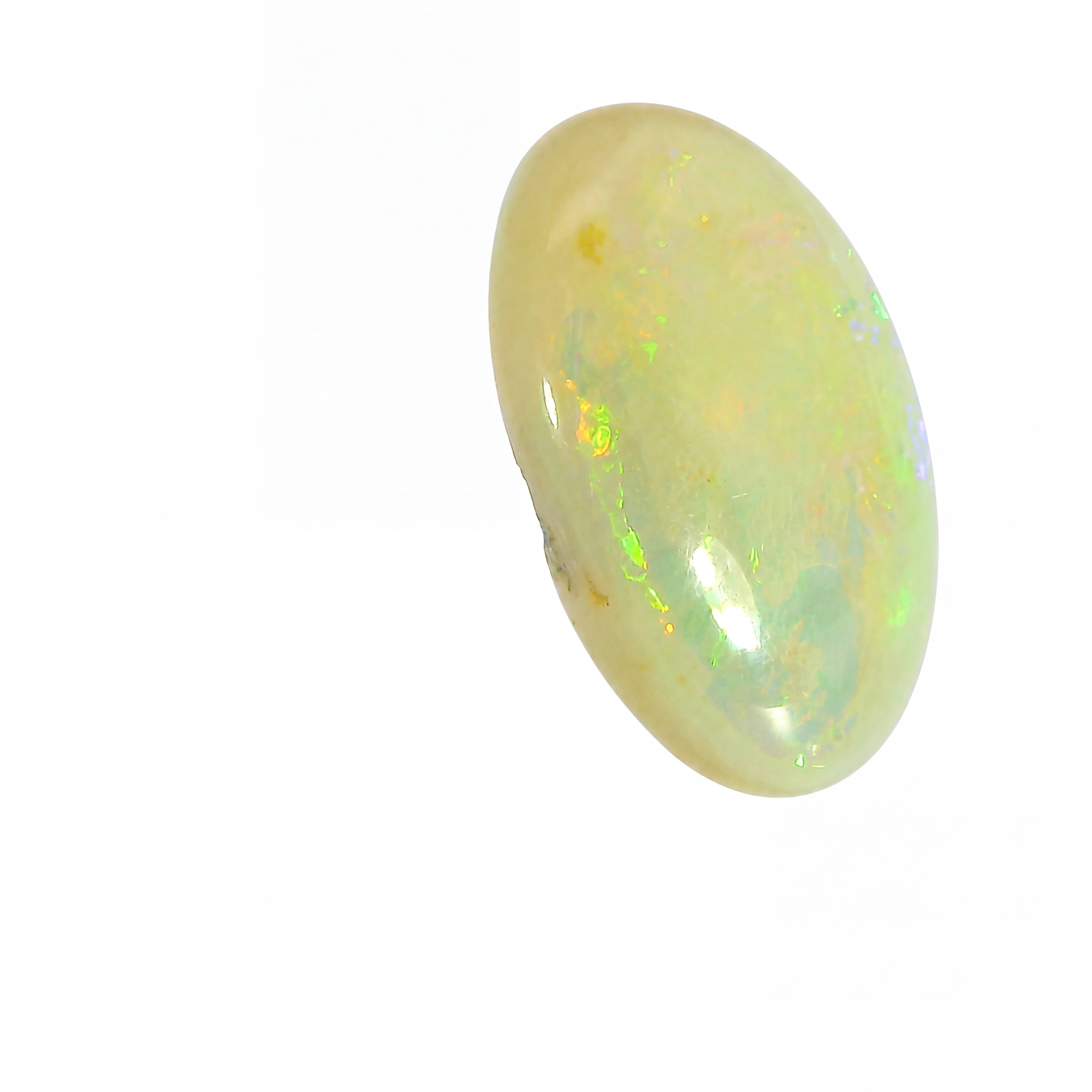 Opal stone with multicolour play on a white background