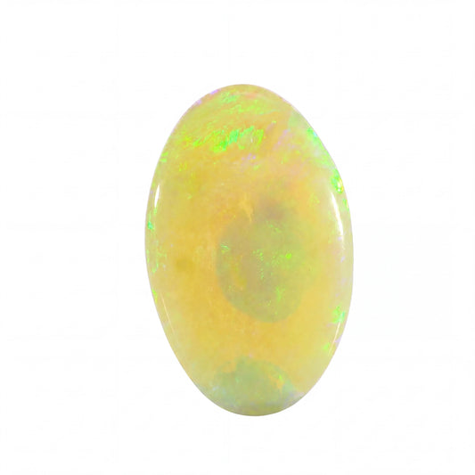 Opal stone with green fluorescence on a white background
