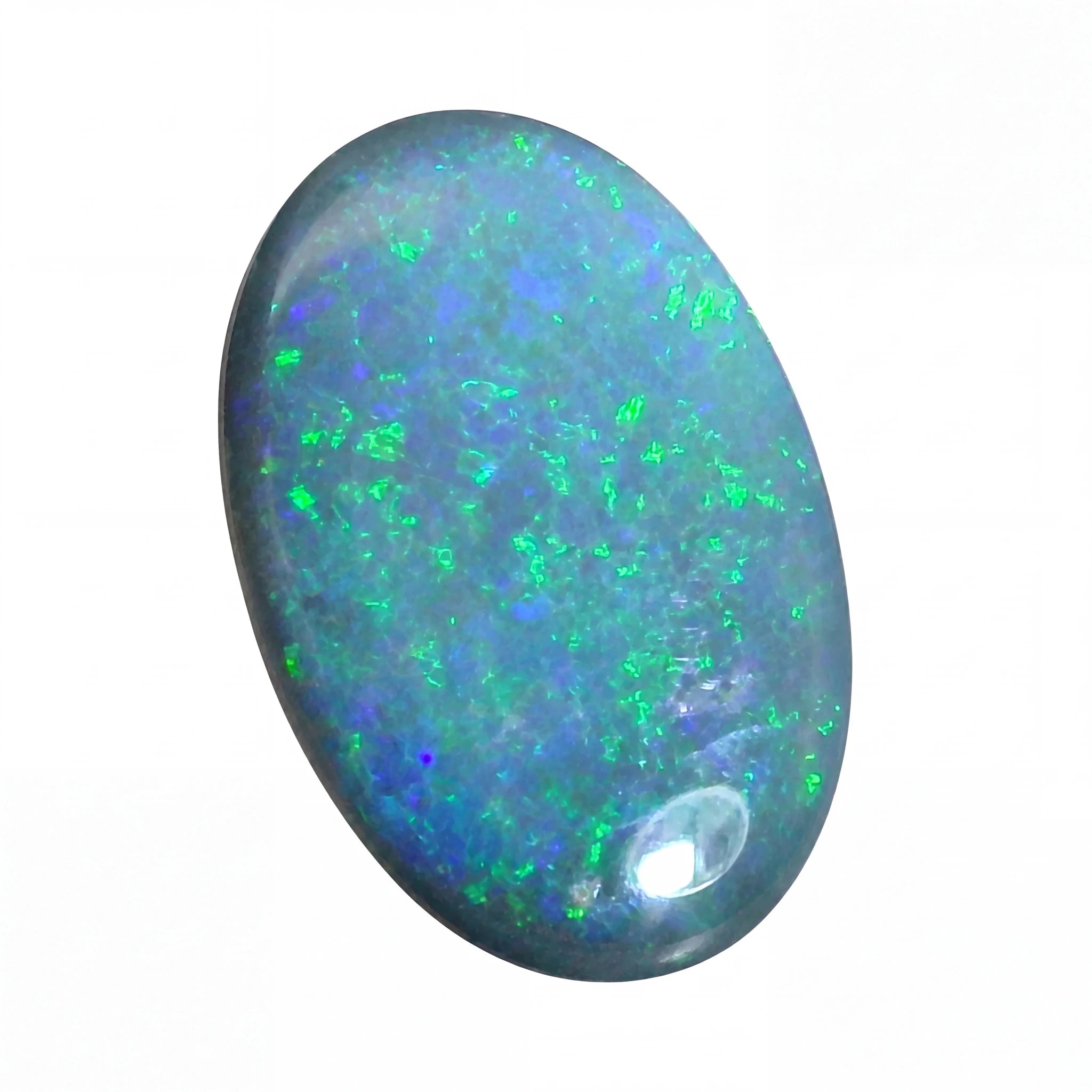 Opal stone with multicolour fluorescence on a white background
