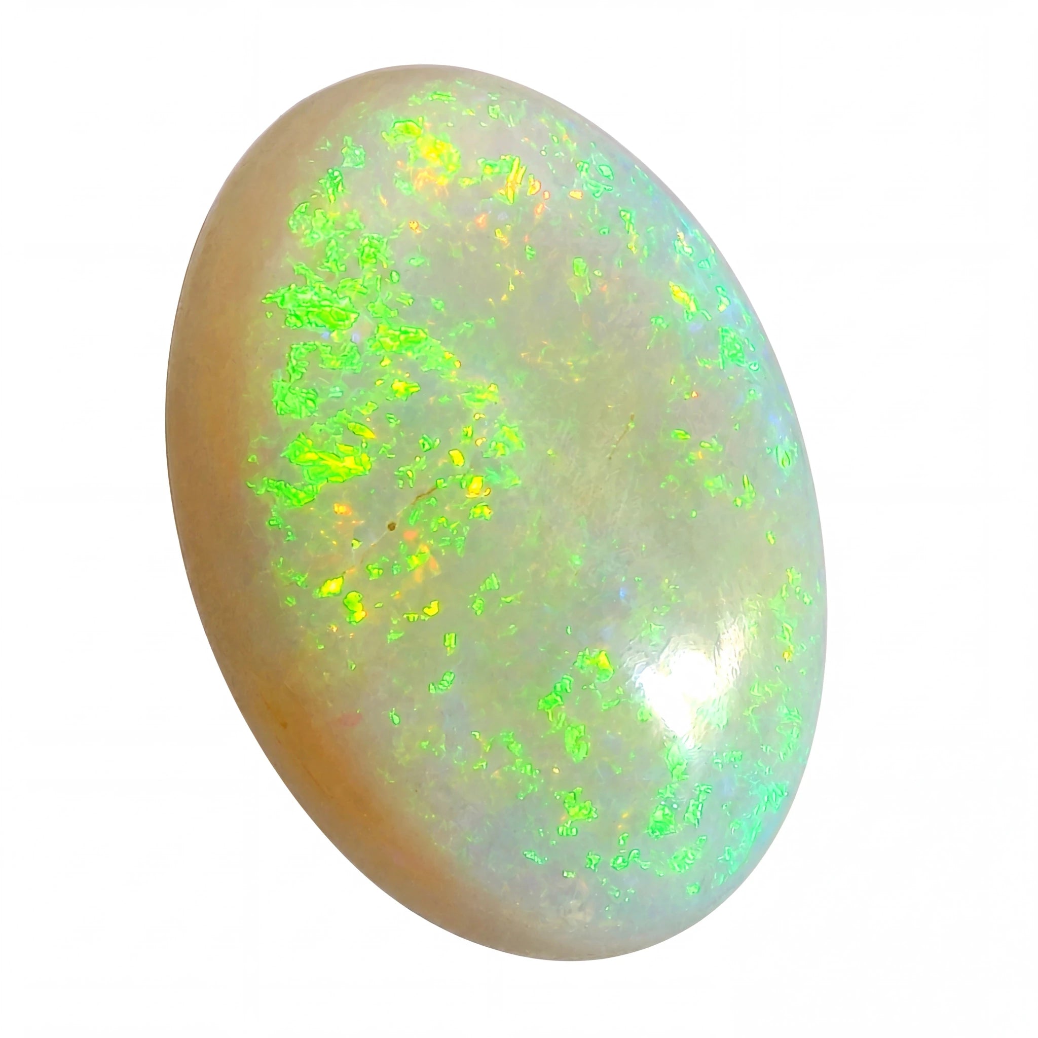 Opal stone with green and yellow fluorescence on a white background