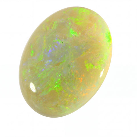 Opal stone with green and orange fluorescence on a white background