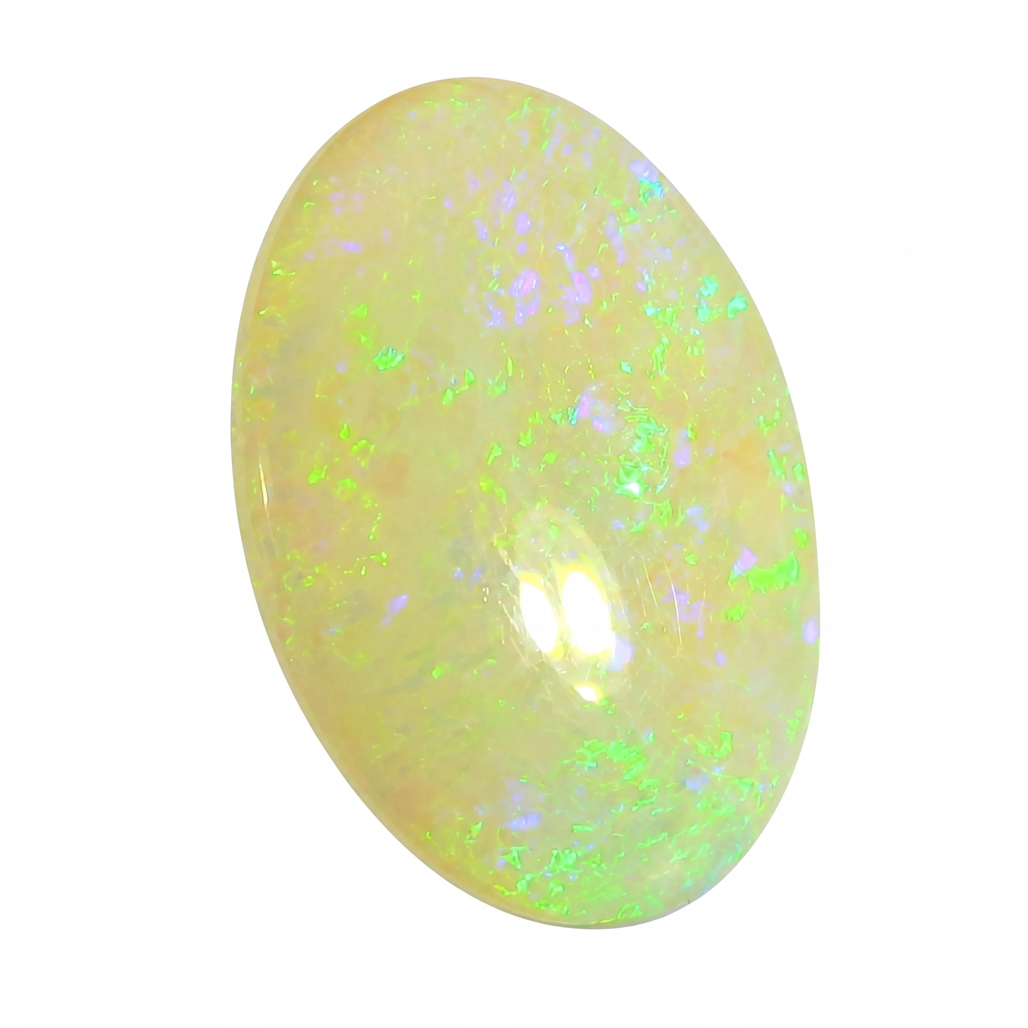 Oval-shaped opal stone with green and white speckles on a white background