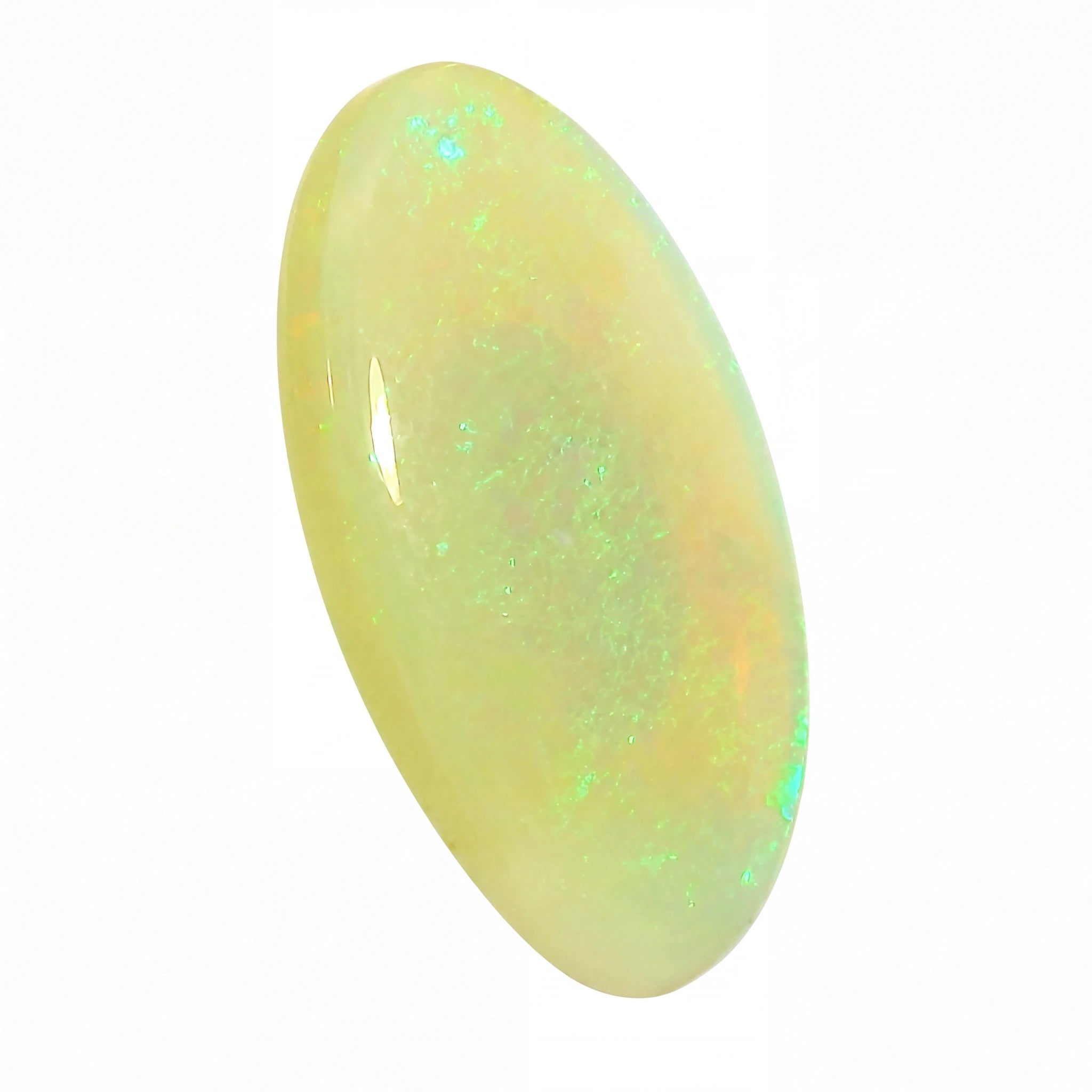 Opal stone with a greenish hue on a white background