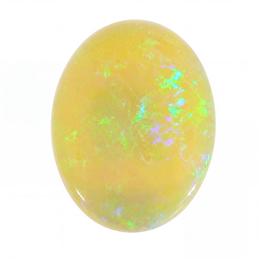 Yellow opal stone with internal multicolour play on a white background