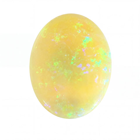 Yellow opal stone with colourful specks on a white background
