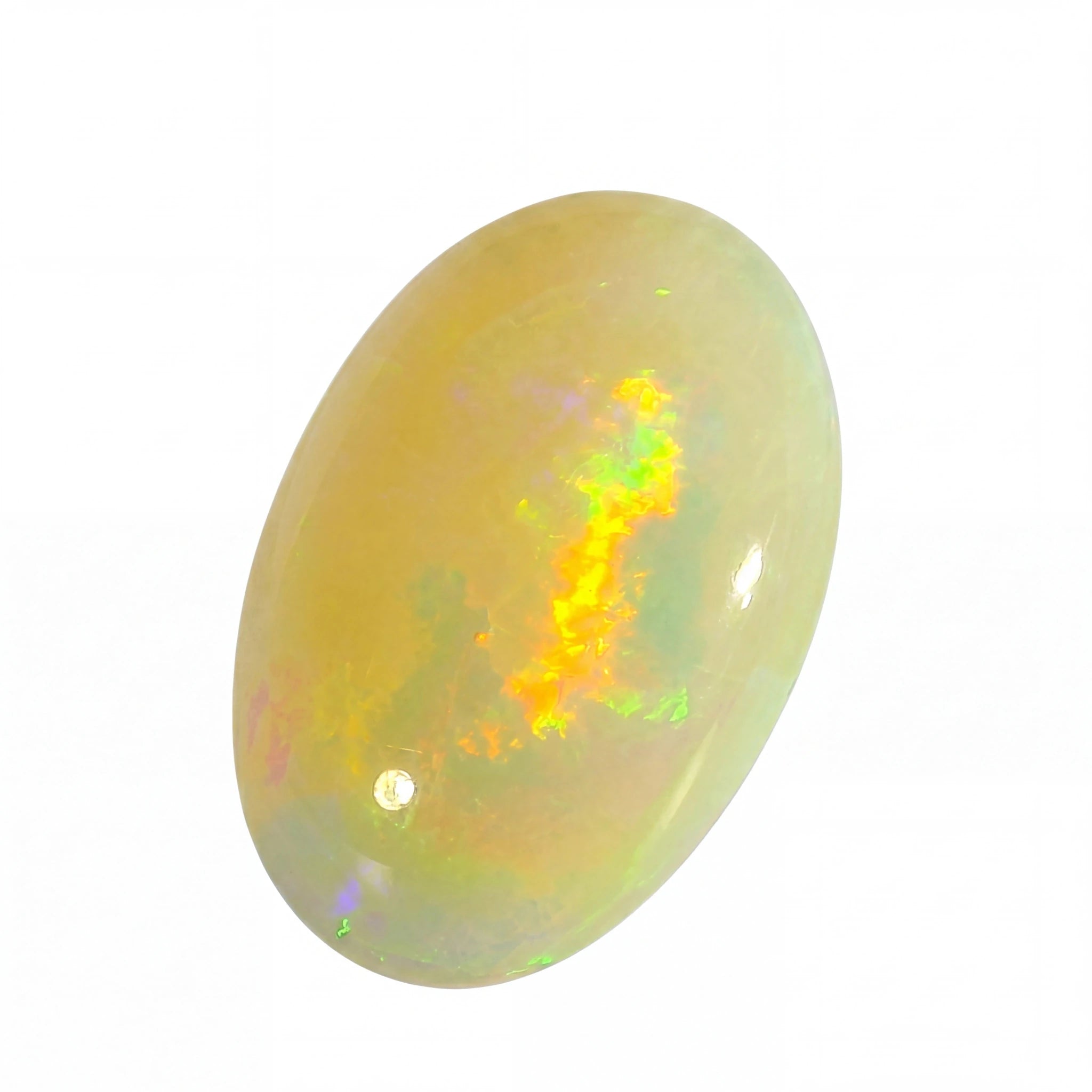 Opal stone with multicoloured play of light on a white background