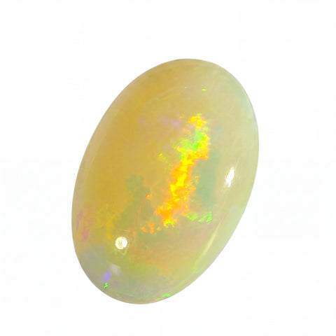 Opal stone with multicoloured play of light on a white background