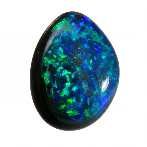 Opal stone with blue and green colours on a white background